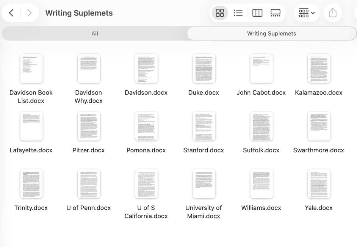 The folder of college essays, one per school.